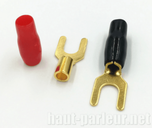 paire de cosse-fourche-haut-parleur-doree